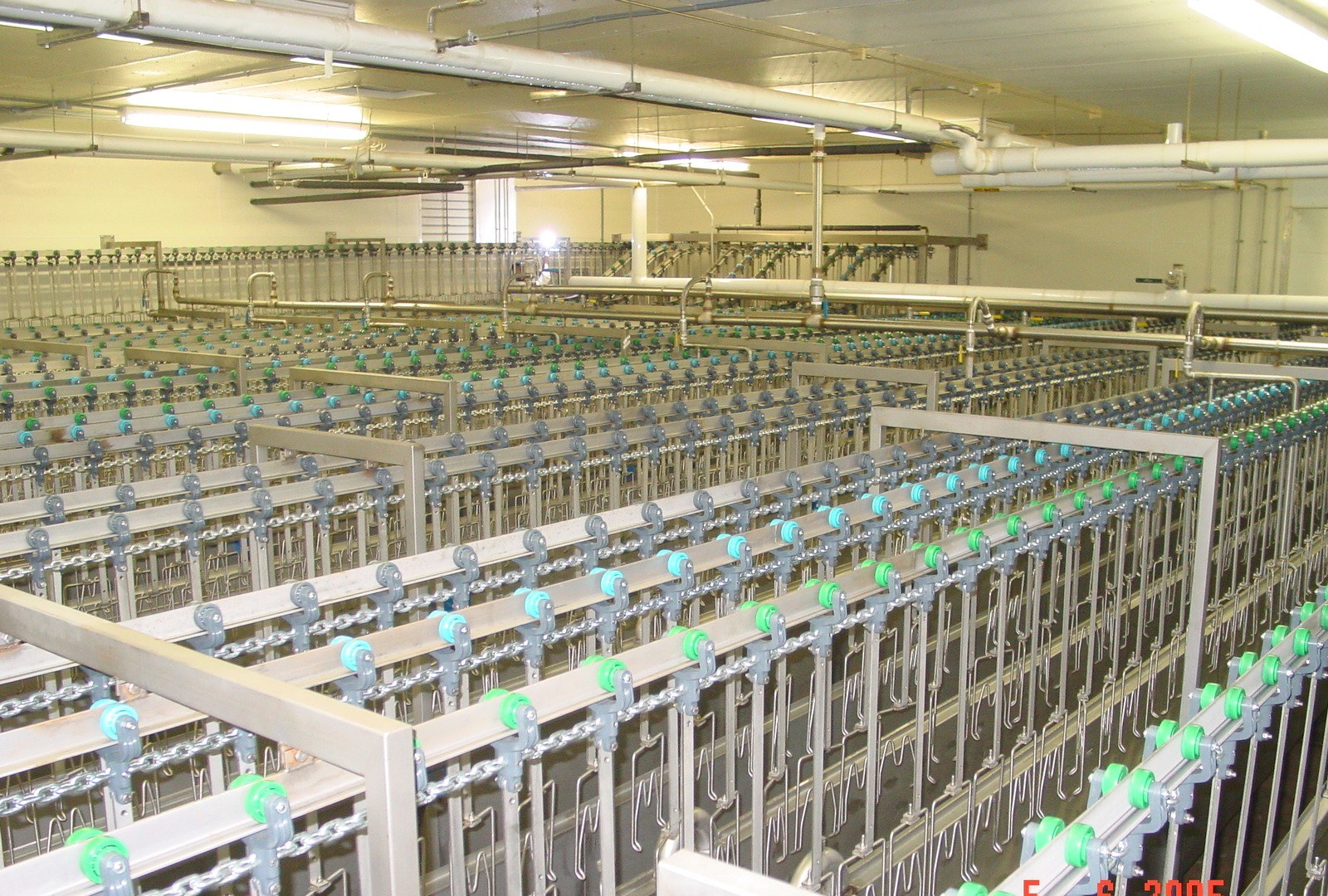 Combi tanks integrated beneath an air-chill line